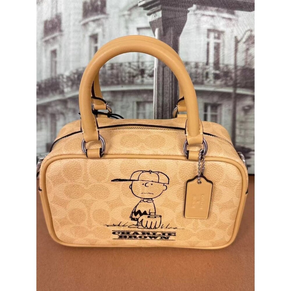 Coach CBJ63 Coach X Peanuts Satchel Crossbody Bag In Signature Canvas With Charl